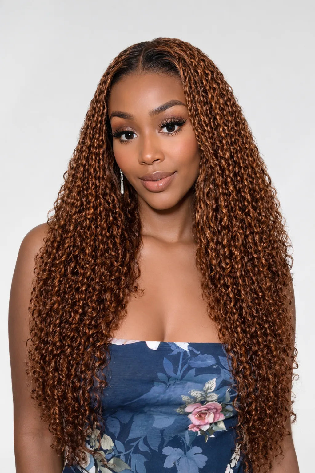 Side view of brown kinky curly lace wig showing natural hairline with soft texture and natural finish