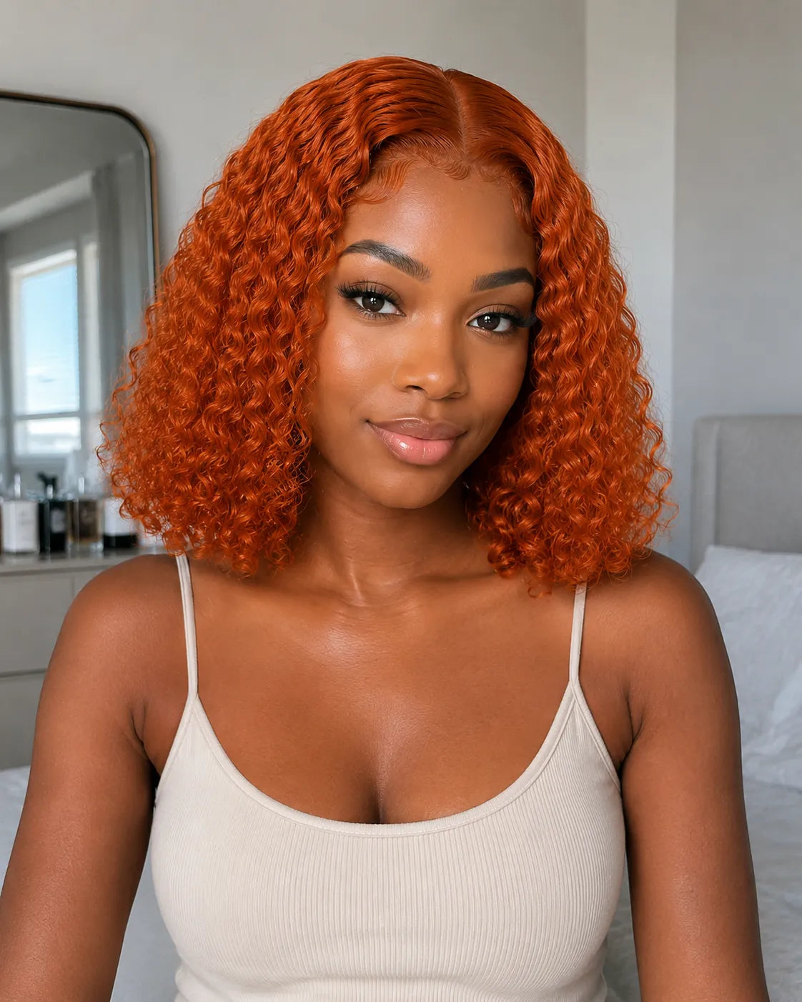 Close-up view of curly human hair wig texture and lace detail with soft texture and natural finish