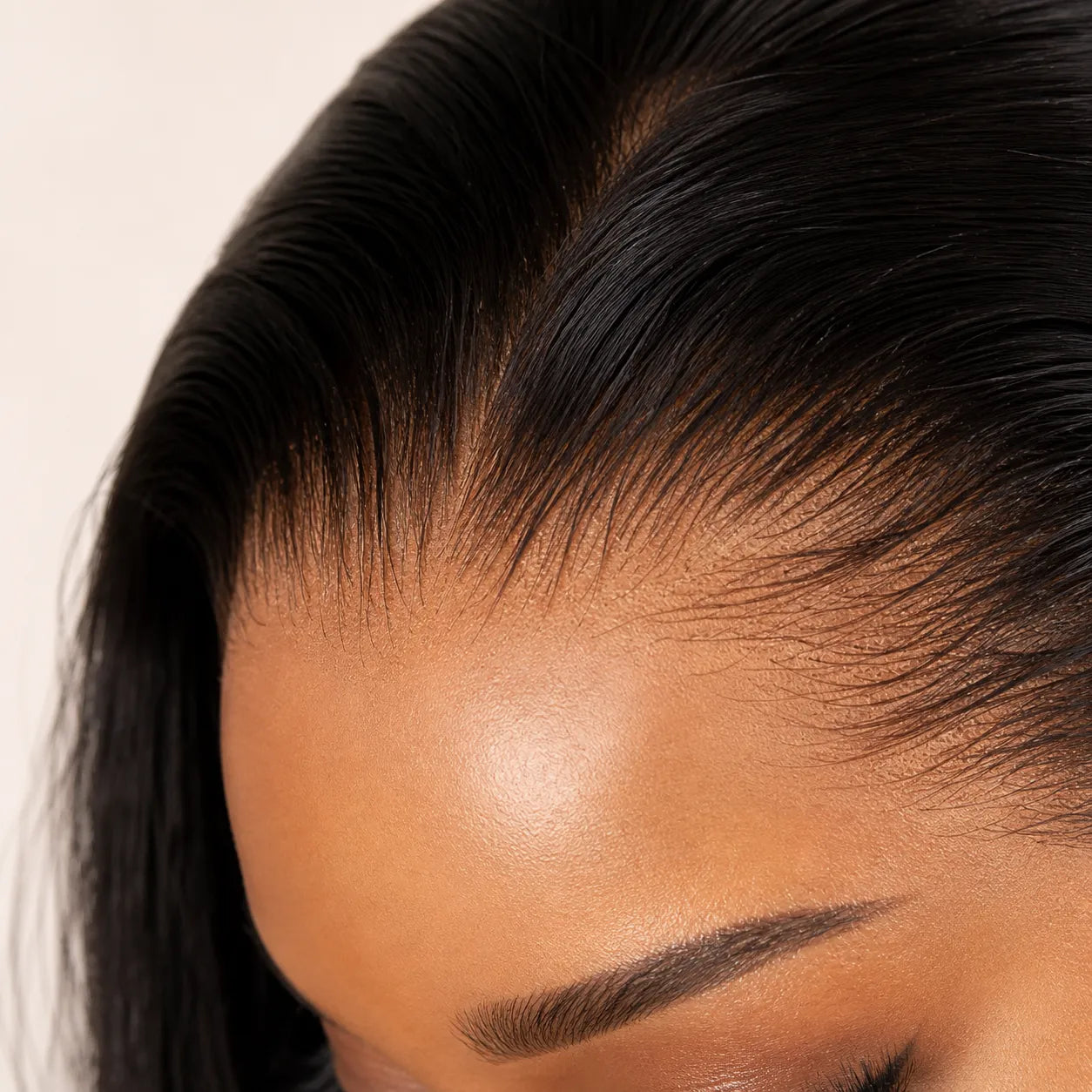 The lace should look realistic and natural, with visible scalp-like parting, clean plucked hairline, small knots, soft baby hairs, and glossy black human hair.