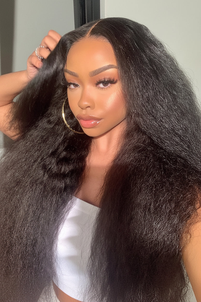 Woman with long, straight hair styled in a way that it frames her face.