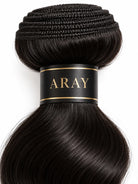 Close-up view of body wave human hair wig texture and lace detail with soft texture and natural finish
