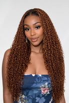 Side view of brown kinky curly lace wig showing natural hairline with soft texture and natural finish