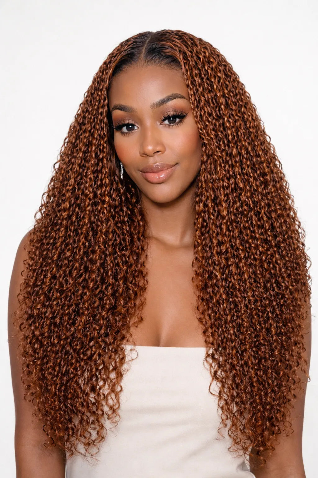 Lifestyle view of model wearing brown kinky curly human hair wig with soft texture and natural finish