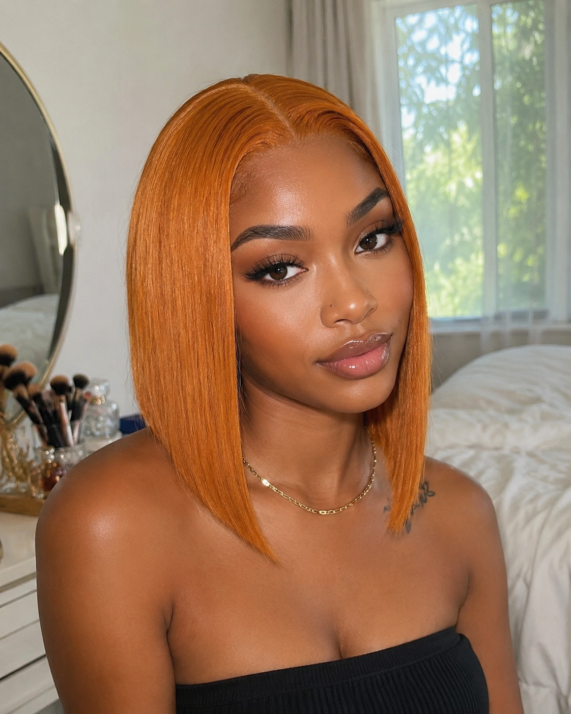 Back view of blonde straight human hair wig with natural volume with soft texture and natural finish