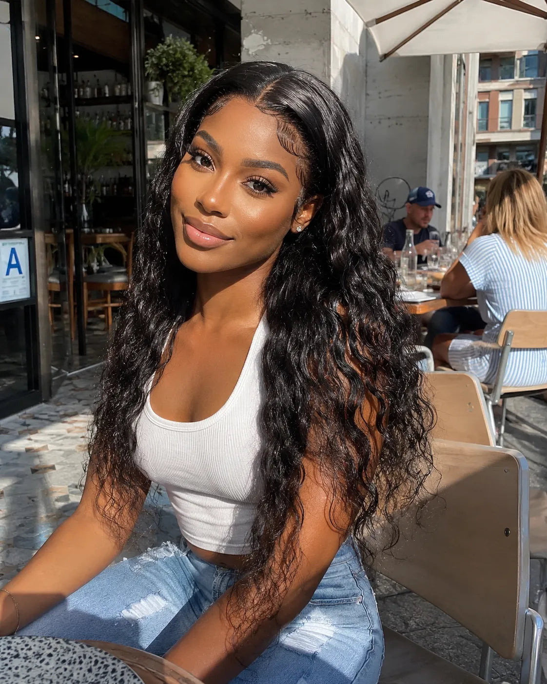 Back view of water wave human hair wig with natural volume with soft texture and natural finish