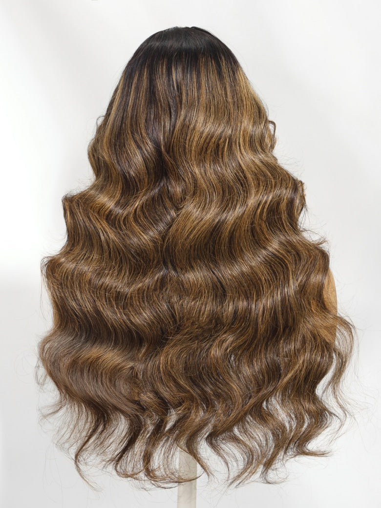 Brown wavy hairpiece on a white background
