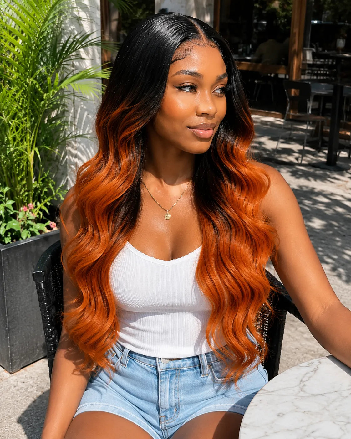 Front view of black body wave human hair wig on model with soft texture and natural finish