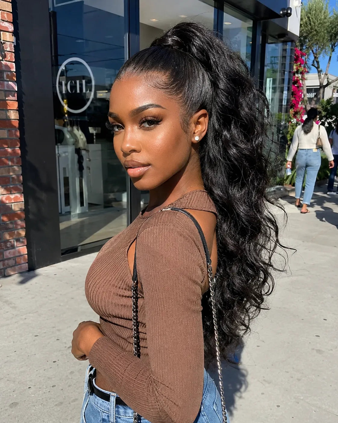Front view of body wave human hair wig on model with soft texture and natural finish