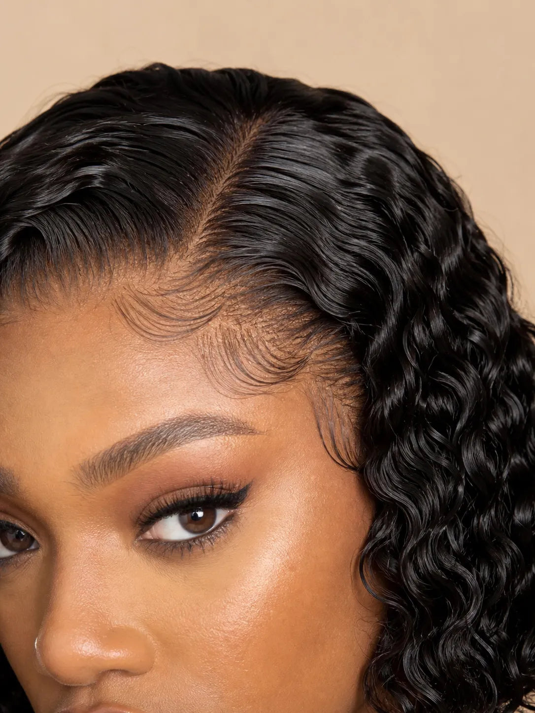 Side view of deep wave lace wig showing natural hairline with soft texture and natural finish