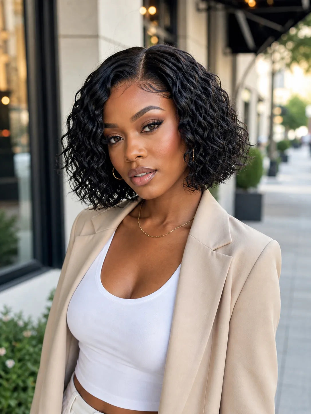 Lifestyle view of model wearing water wave human hair wig with soft texture and natural finish