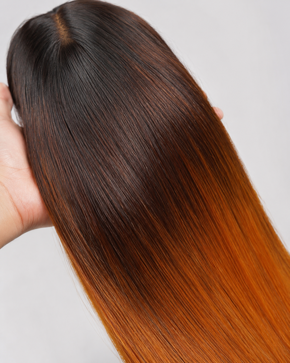 Detail view of realistic lace parting and natural hairline with soft texture and natural finish
