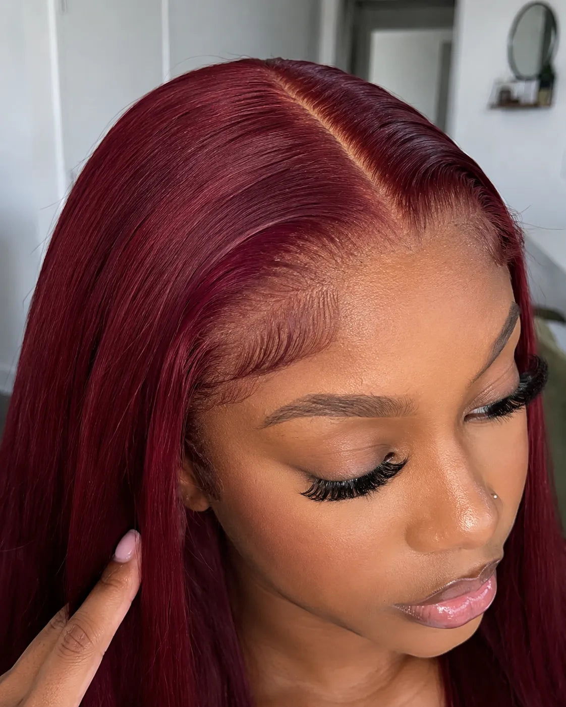 Detail view of lace front and natural hairline with soft texture and natural finish