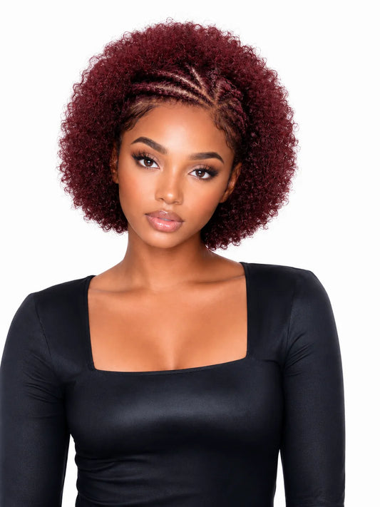 Close-up view of natural black curly human hair wig texture and lace detail