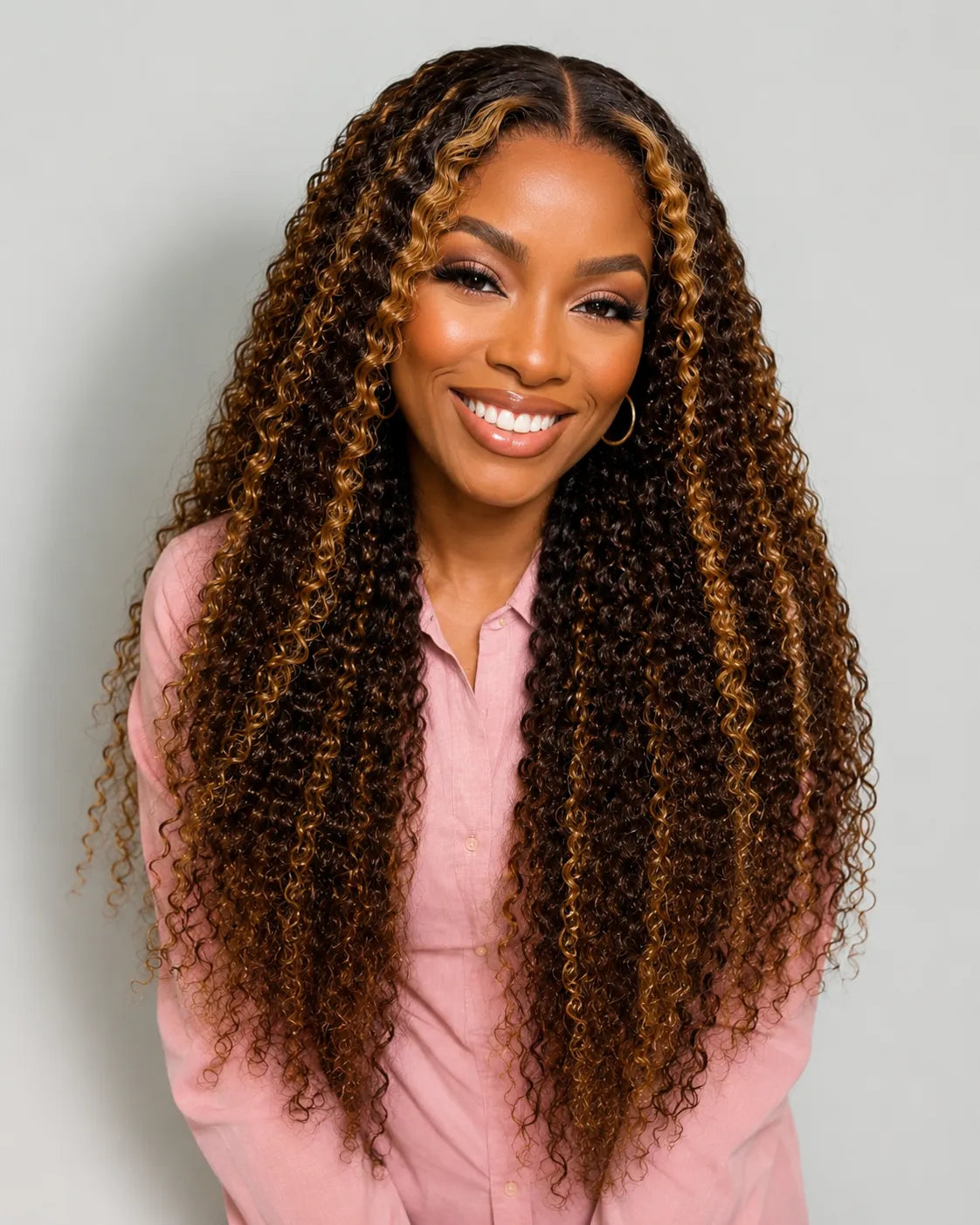 Side view of honey blonde kinky curly lace wig showing natural hairline