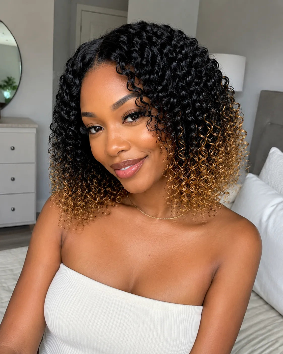 Side view of honey blonde deep wave lace wig showing natural hairline with soft texture and natural finish