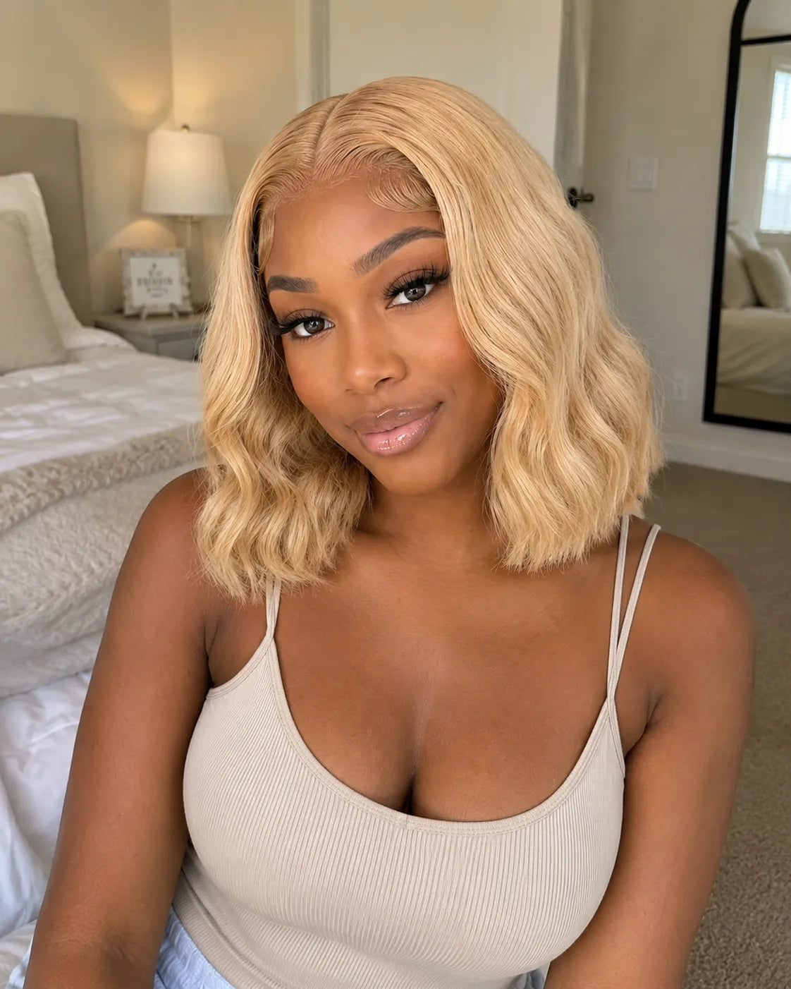 Back view of honey blonde body wave human hair wig with natural volume