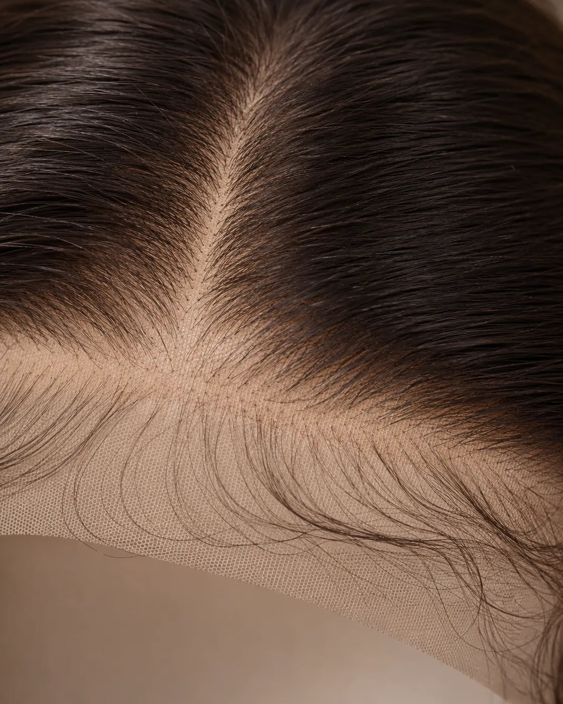 Detail view of lace front and natural hairline with soft texture and natural finish