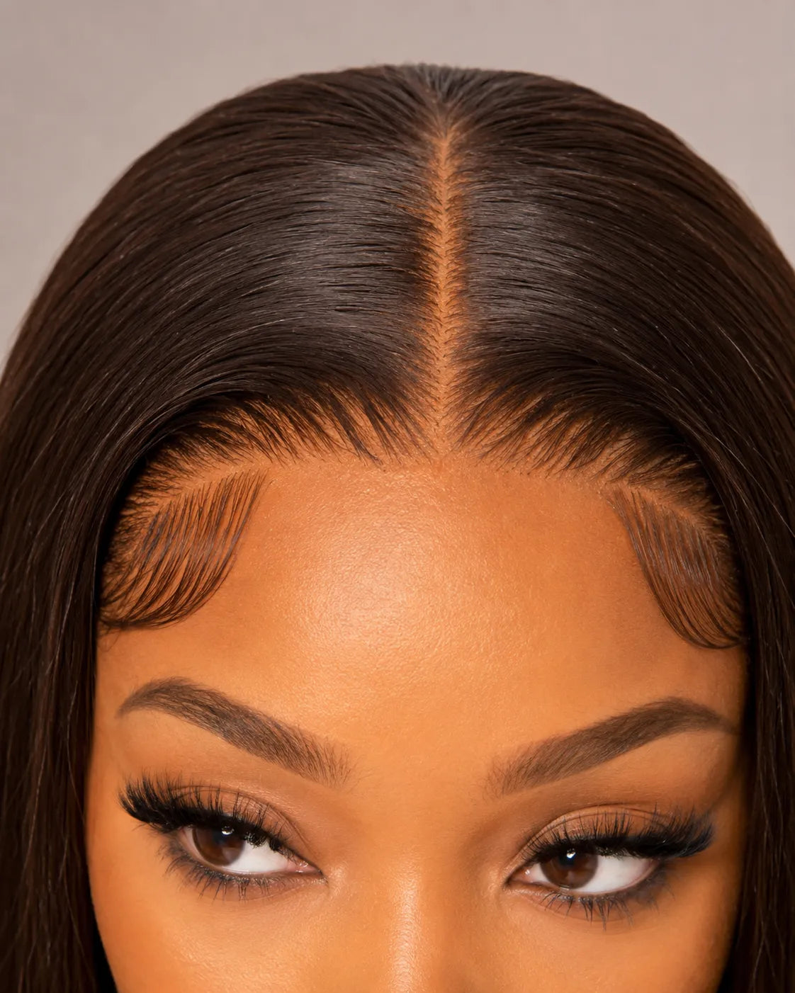 Detail view of glueless wig cap and lace construction with soft texture and natural finish