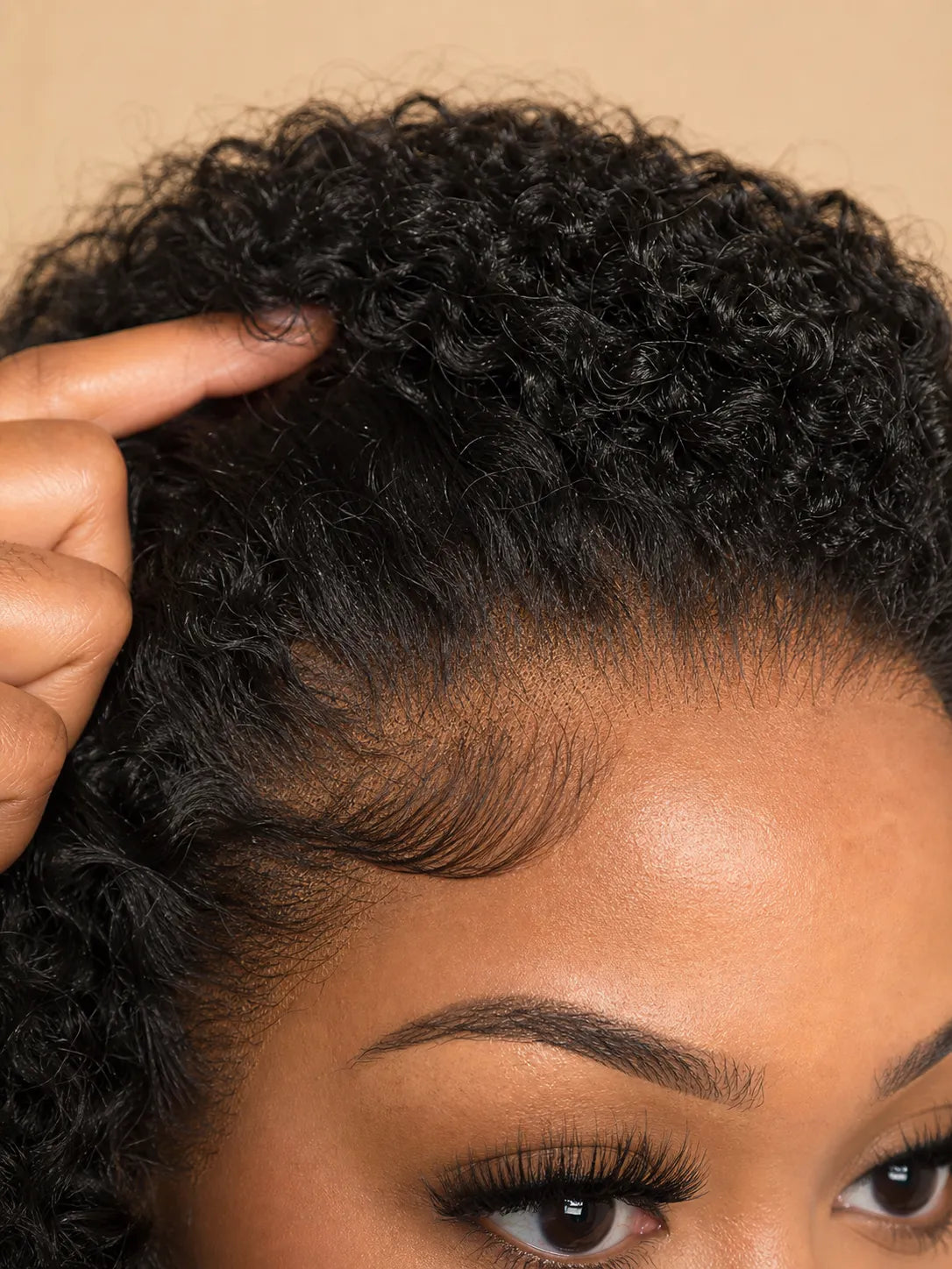 Detail view of glueless wig cap and lace construction with soft texture and natural finish