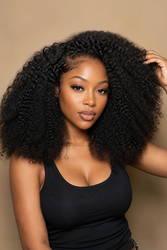 Front view of kinky curly lace front human hair wig on model with soft texture and natural finish
