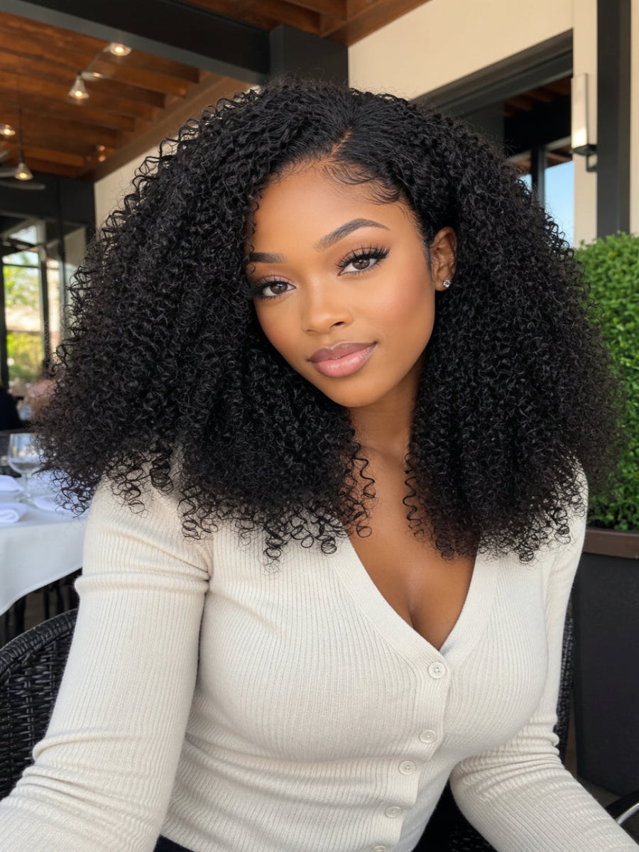 Woman with styled hair sitting outdoors