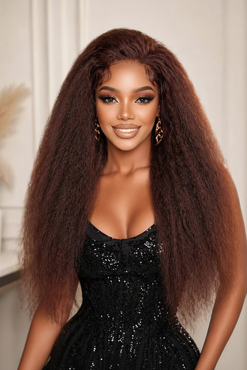 Woman with long, styled hair wearing a black sequin dress indoors.