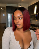 Lifestyle view of model wearing straight human hair wig with soft texture and natural finish