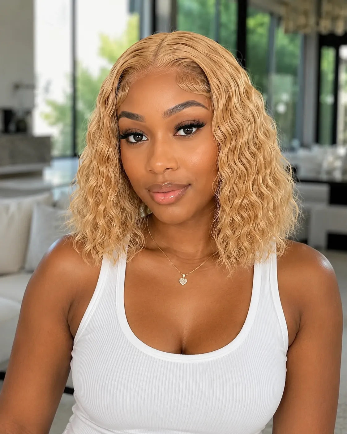 Side view of honey blonde water wave lace wig showing natural hairline