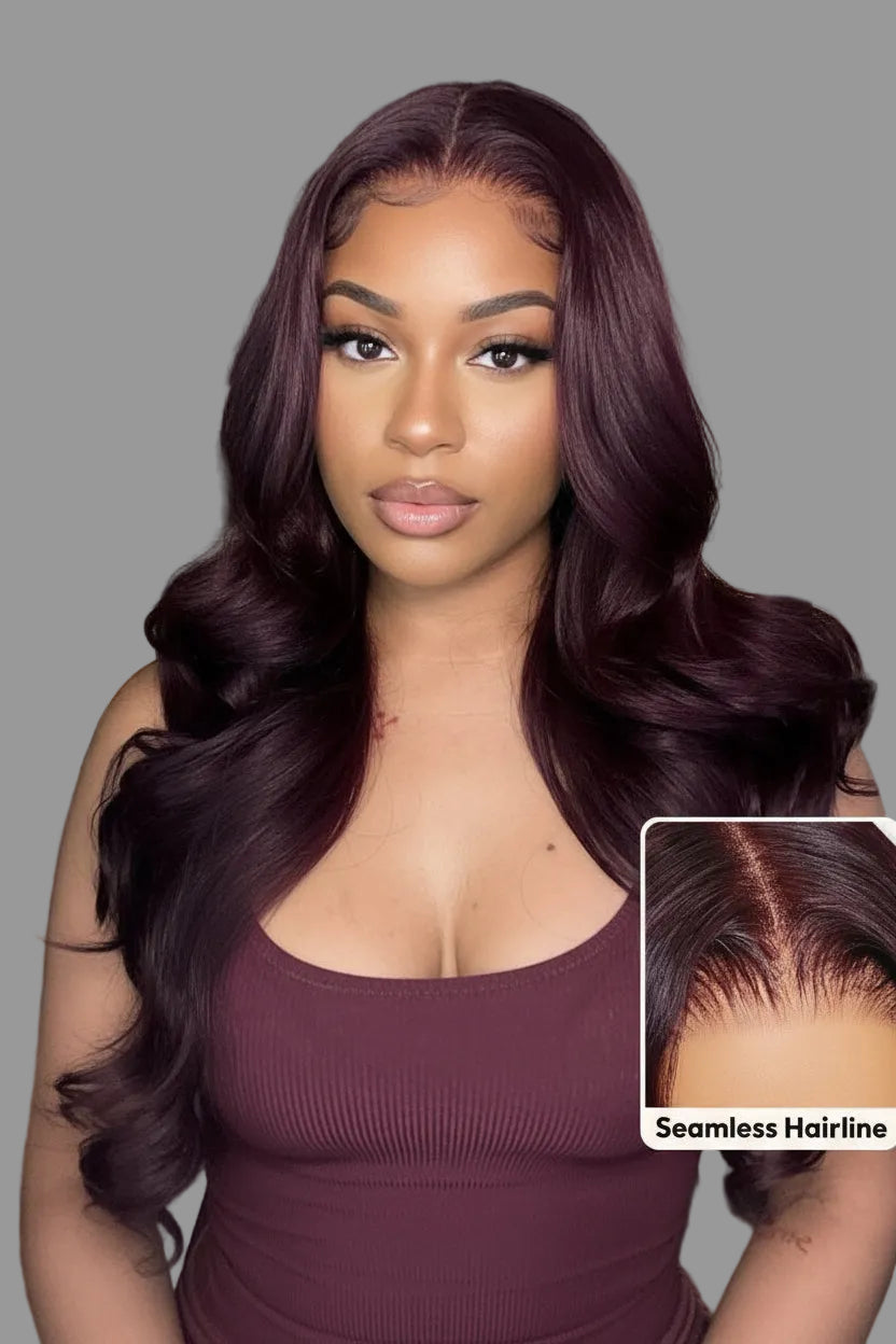 Woman with long purple wig in a bedroom setting, showcasing a seamless hairline.
