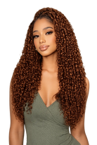Front view of brown kinky curly human hair wig on model with soft texture and natural finish