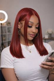 Back view of burgundy straight human hair wig with natural volume with soft texture and natural finish